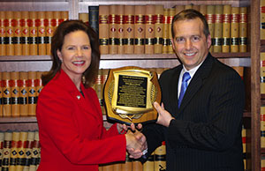 Image of Ohio Supreme Court Justice Sharon L. Kennedy receiving the Award of Excellence from Butler County Bar Association President Thomas B. Allen. Image of Ohio Supreme Court Justice Sharon L. Kennedy receiving the Award of Excellence from Butler County Bar Association President Thomas B. Allen.