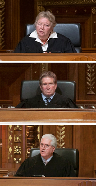 Image of a female judge and two male judges