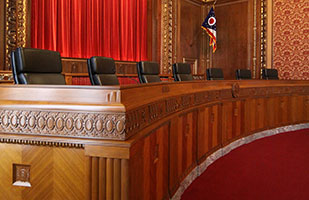 Image of a an empty Ohio Supreme Court bench in the Thomas J. Moyer Ohio Judicial Center Image of a an empty Ohio Supreme Court bench in the Thomas J. Moyer Ohio Judicial Center