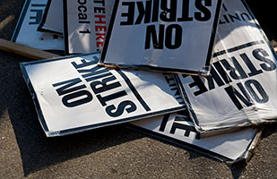 Image of a pile of signs that say 'On Strike' (John Kershner/Thinkstock) Image of a pile of signs that say 'On Strike' (John Kershner/Thinkstock)