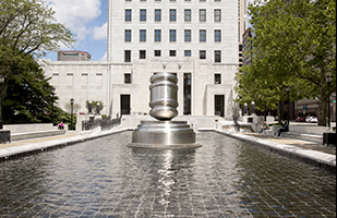 Image of the giant gavel in the south reflecting pool at the Thomas J. Moyer Ohio Judicial Center