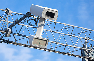 Image of a red-light and speed camera Image of a red-light and speed camera