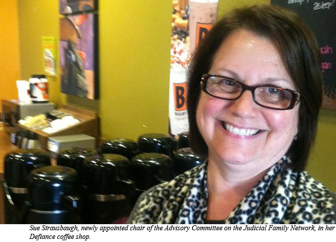 Sue Strausbaugh, newly appointed chair of the Advisory Committee on the Judicial Family Network, in her Defiance coffee shop.