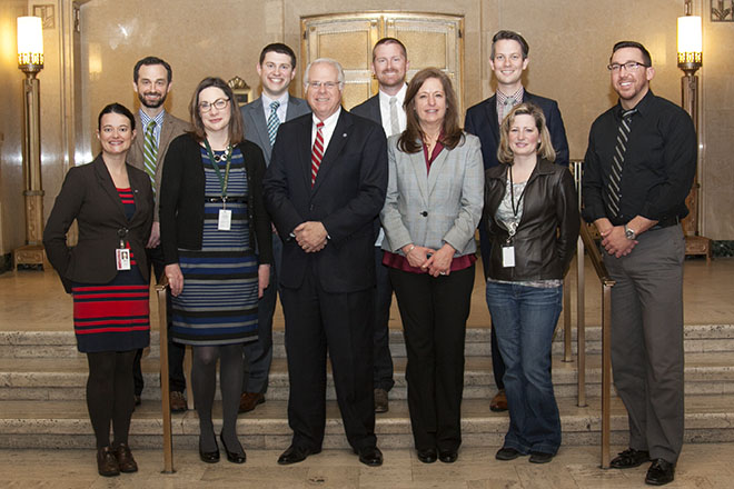 Image of retiring executive director of the Ohio Judicial Conference, Mark Schweikert, and other Judicial Conference staff.