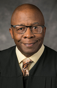 Image of the late Judge Larry Jones in his black judicial robe