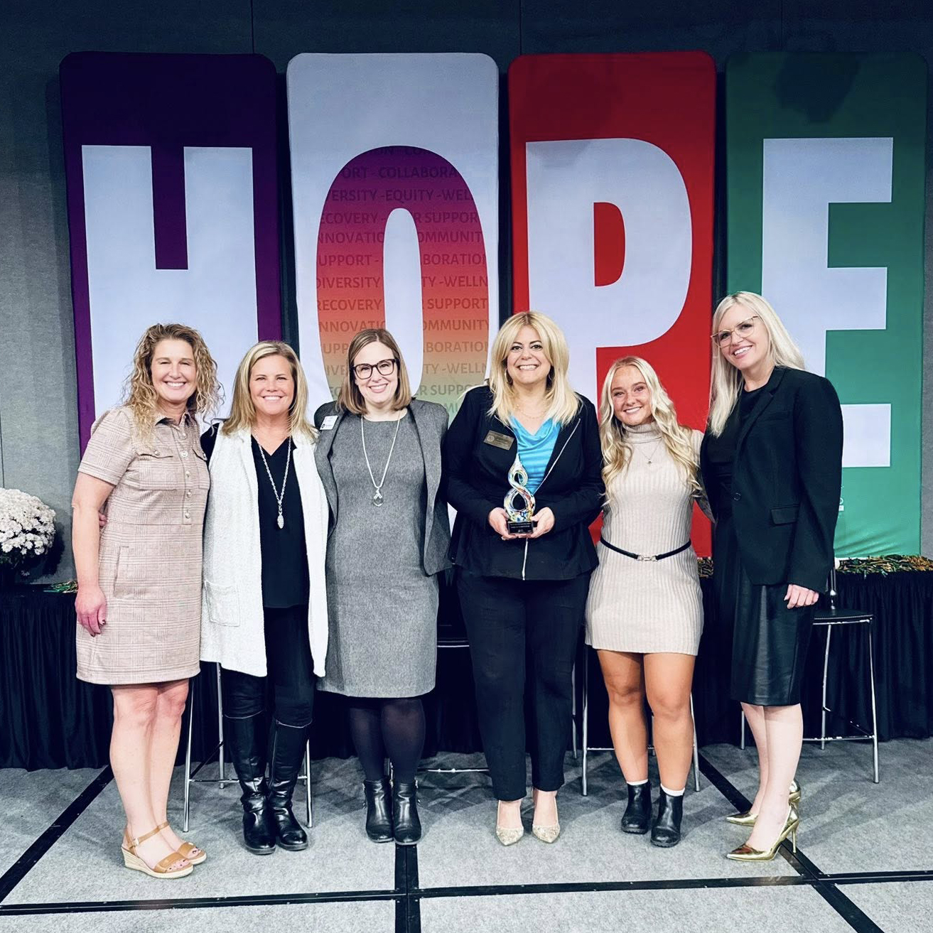 A group of women smiling