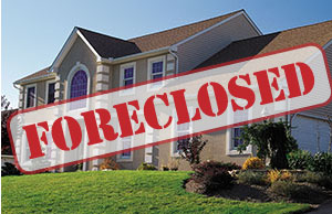 Image of a home with the word 'Forclosed' stamped on top of it