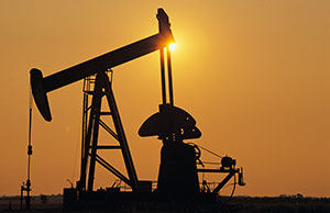 Image of a pumpjack on an oil well.