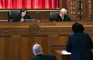 Image of Ohio Supreme Court Chief Justice Maureen O'Connor and Justice Terrence O'Donnell listening to an attorney present oral argument