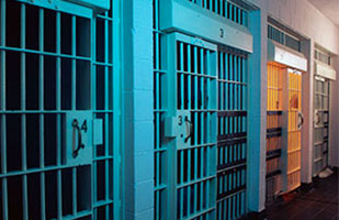 Image of a row of prison cells