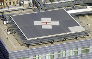 Image of a helipad on the roof of a hospital.