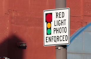 Image of red-light camera notification sign