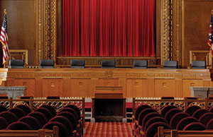 Image of an empty bench and courtroom at the Thomas J. Moyer Ohio Judicial Center