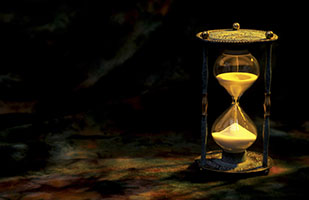 Image of an hourglass filled with sand