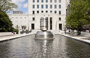 Image of the giant stainless steel gavel located in the south plaza of the Thomas J. Moyer Ohio Judicial Center
