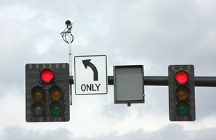 Image of a traffic signal with a camera