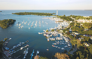 Image of an aerial view of a bay full of docks and boats