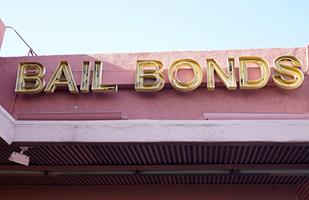 Image of a bail bonds sign on a building