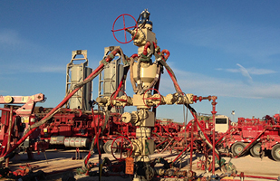 Image of an oil drill rig used in the practice of fracking.