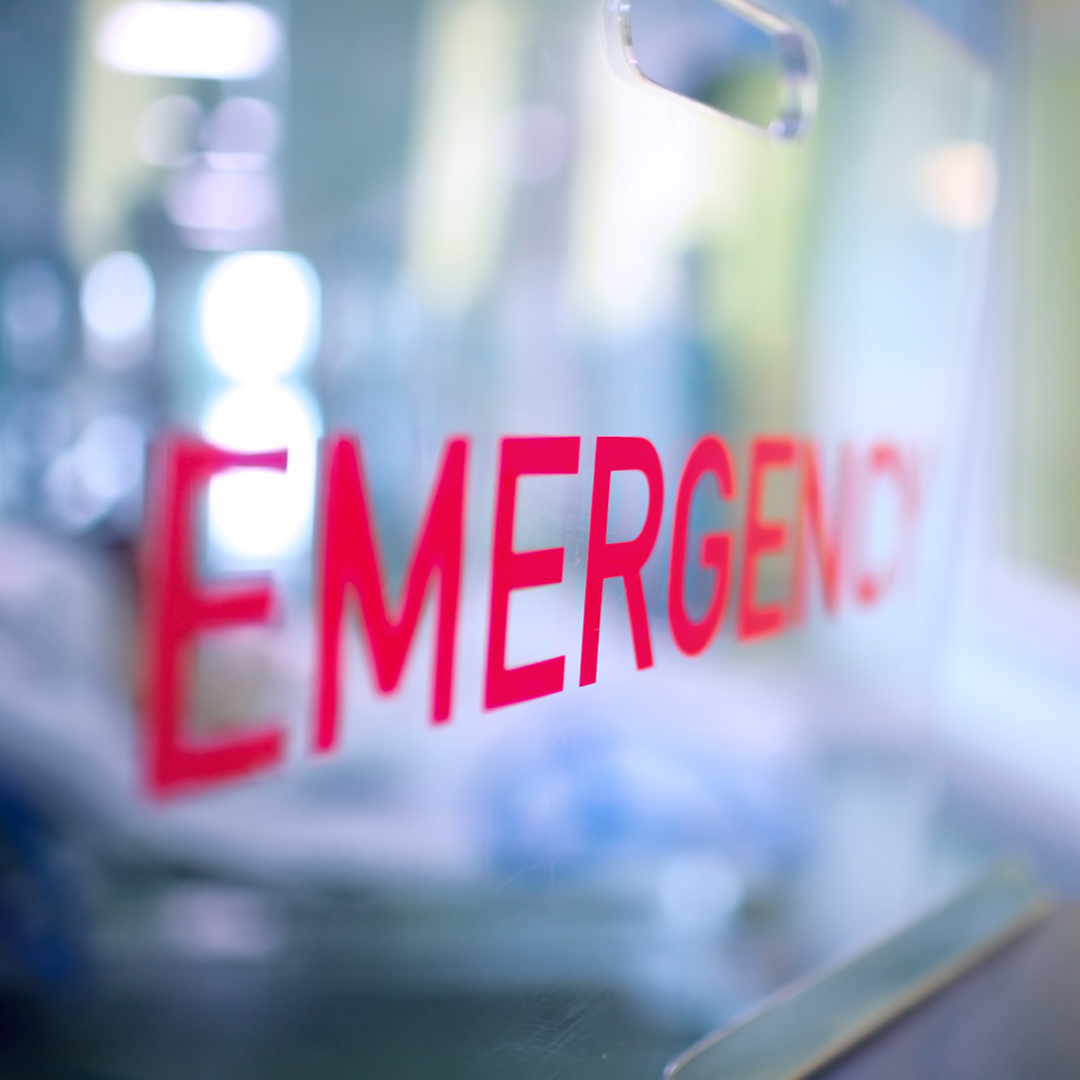 The word 'Emergency' in red