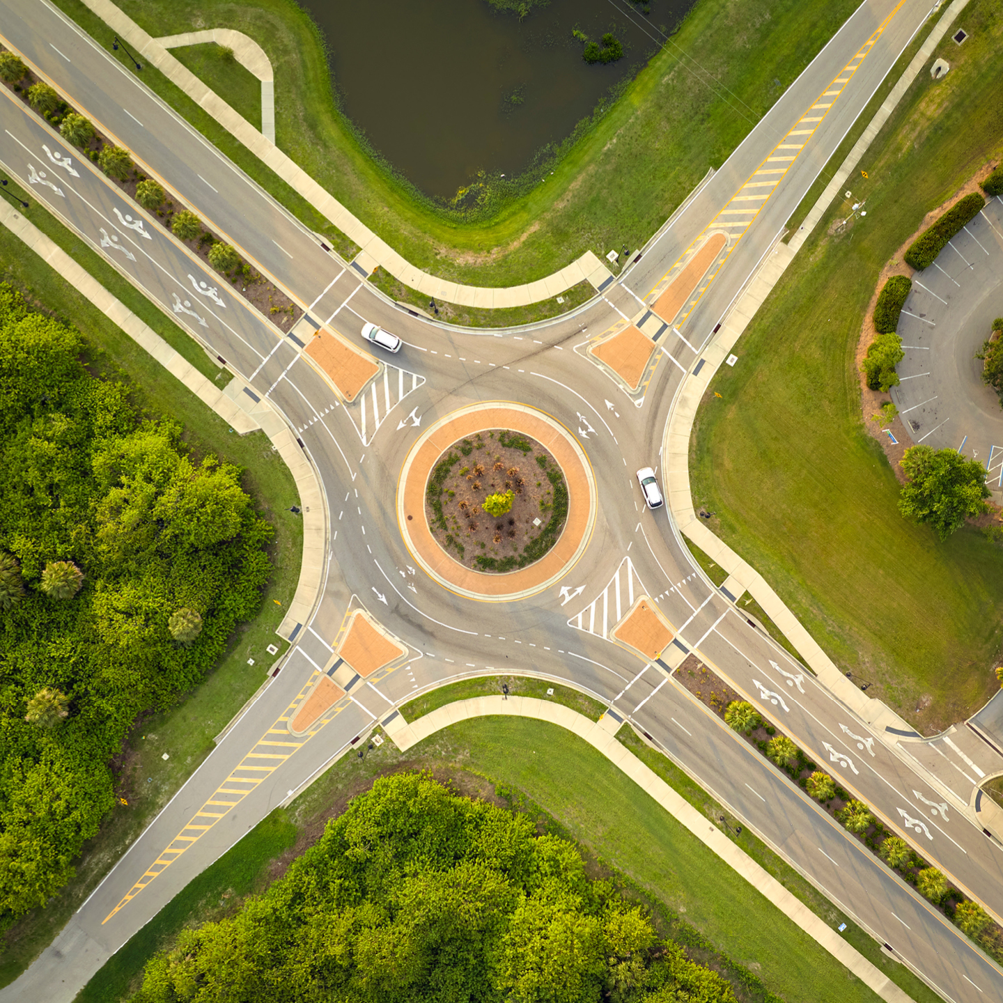 An arial view of a four way roundabout.