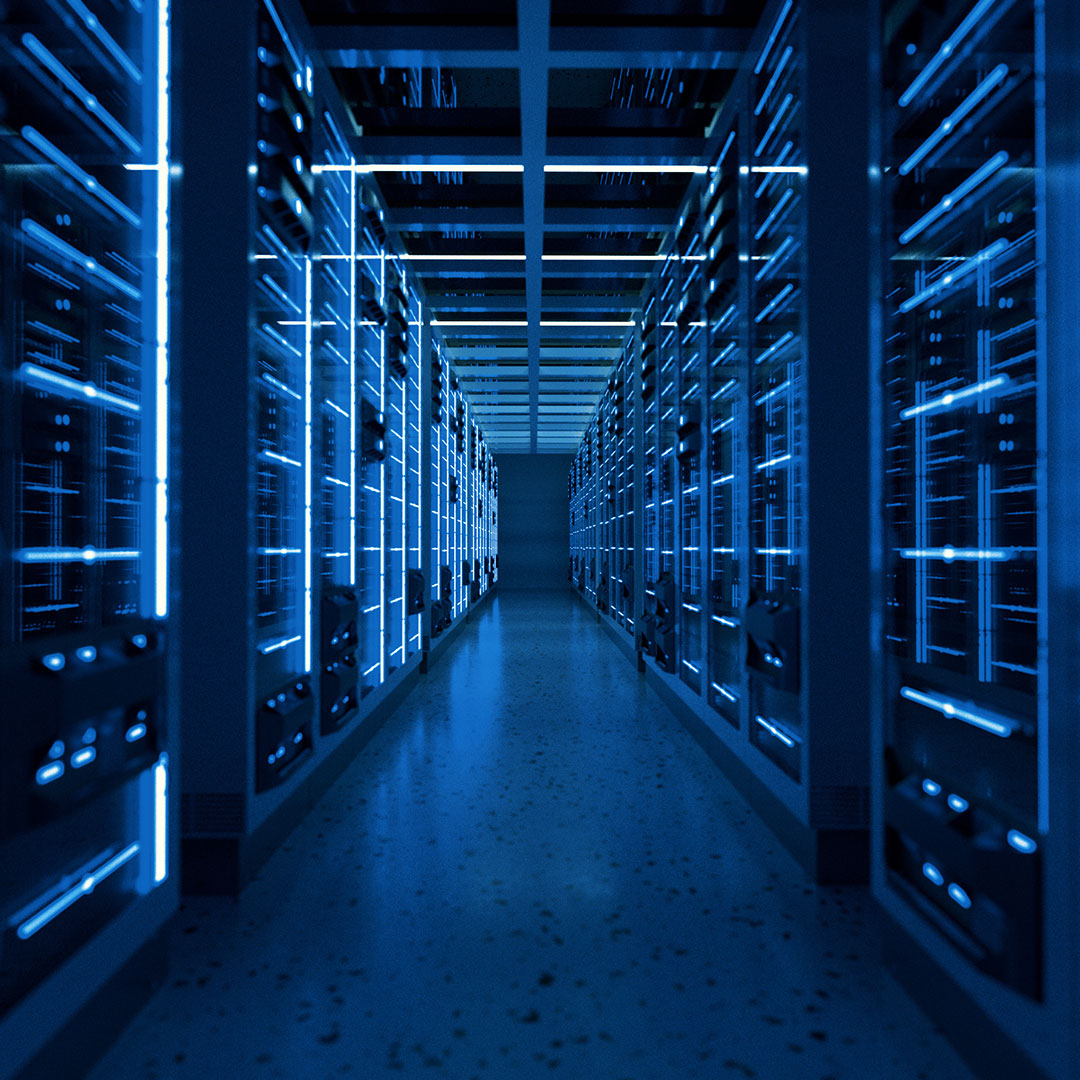 Rows of illuminated server racks lining a data center corridor with neon blue lighting running horizontally and vertically.