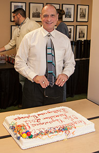 Colleagues delivered a sweet surprise to Dr. Frank Ezzo during an October 26 training session. Ezzo chose to lead the training rather than attend an awards ceremony where he was being honored. Colleagues delivered a sweet surprise to Dr. Frank Ezzo during an October 26 training session. Ezzo chose to lead the training rather than attend an awards ceremony where he was being honored.