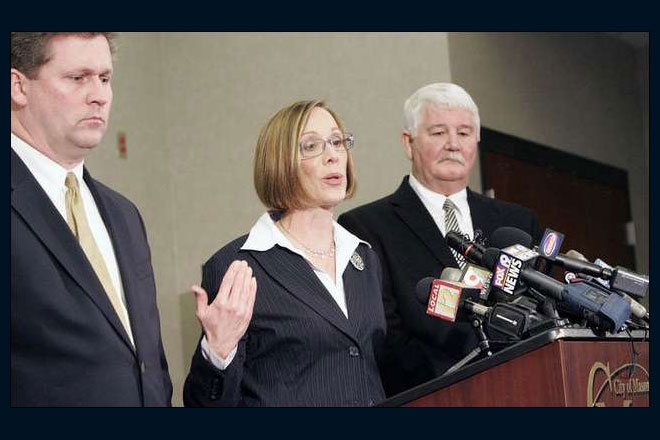 From left: Dr. Russell Uptegrove, Warren County Coroner, the late Judge Rachel A. Hutzel, and Ron Ferrell, Mason Police Chief. Photo: Cincinnati Enquirer. Used with permission. From left: Dr. Russell Uptegrove, Warren County Coroner, the late Judge Rachel A. Hutzel, and Ron Ferrell, Mason Police Chief. Photo: Cincinnati Enquirer. Used with permission.