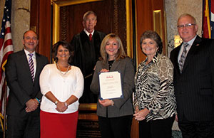 Barberton Municipal Court Administrator Susan Sweeney (center) received the 2012 Chief Justice Thomas J. Moyer Memorial Scholarship Award from the Ohio Association for Court Administration on October 18. With Sweeney are, from left, Judge David E. Fish, Judge Christine L. Croce, OACA President Sylvia Argento, and Ohio Judicial College Director Milt Nuzum. Barberton Municipal Court Administrator Susan Sweeney (center) received the 2012 Chief Justice Thomas J. Moyer Memorial Scholarship Award from the Ohio Association for Court Administration on October 18. With Sweeney are, from left, Judge David E. Fish, Judge Christine L. Croce, OACA President Sylvia Argento, and Ohio Judicial College Director Milt Nuzum.