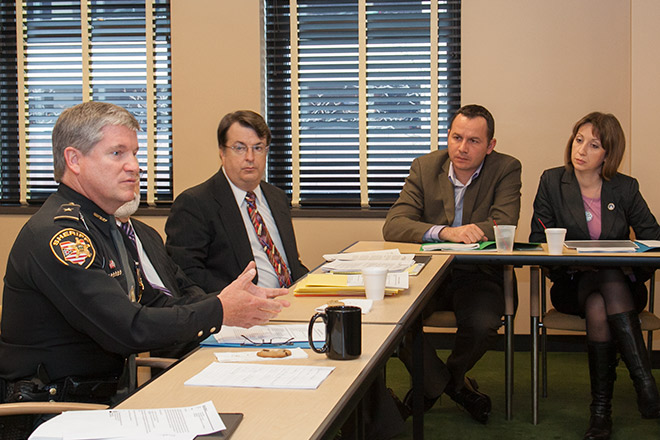 Warren County Sheriff Larry Sims (left) and Franklin County Assistant Prosecutor Jeff Rogers speak with Serbian delegates Dejan Kovacevic and Tatjana Vasiljevic-Veljkovic during their visit to the Thomas J. Moyer Ohio Judicial Center.