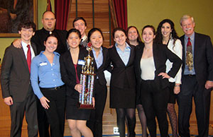 Image of students from Indian Hill High School posing with their first place trophy. Image of students from Indian Hill High School posing with their first place trophy.