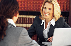 Image of an attorney and opposing counsel. Image of an attorney and opposing counsel.