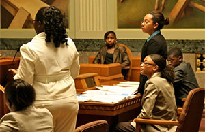 Image of students participating in a Law and Leadership Institute mock trial. Image of students participating in a Law and Leadership Institute mock trial.