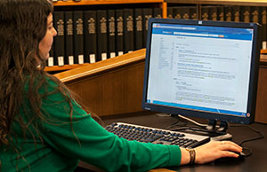 Image of a woman using a computer