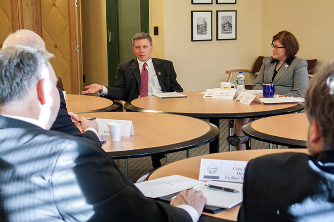 Image of Ohio Supreme Court Administrative Director Michael L. Buenger speaking with members of Supreme Court senior staff at a conference table Image of Ohio Supreme Court Administrative Director Michael L. Buenger speaking with members of Supreme Court senior staff at a conference table