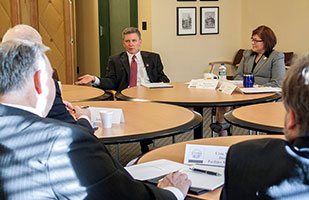 Image of Ohio Supreme Court Administrative Director Michael L. Buenger speaking with members of Supreme Court senior staff at a conference table Image of Ohio Supreme Court Administrative Director Michael L. Buenger speaking with members of Supreme Court senior staff at a conference table
