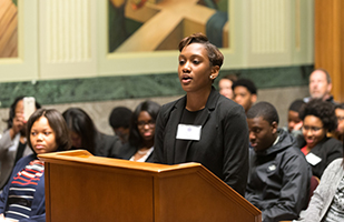 Image of a student standing at a podium completing in the Law and Leadership Institute's 2016 Academic Year Competition. Image of a student standing at a podium completing in the Law and Leadership Institute's 2016 Academic Year Competition.