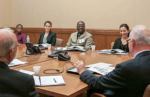 Image of Columbus International Project visitors meeting with court staff