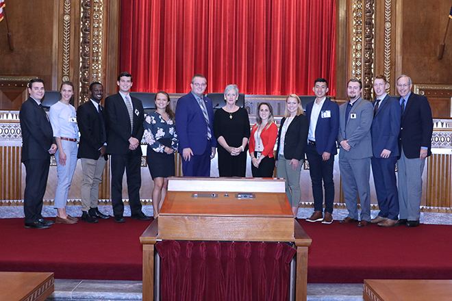 Image of Ohio Supreme Court Chief Justice Maureen O'Connor with a group of University of Dayton Statehouse Civic Scholars.