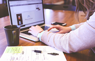 Image of a woman using a laptop computer