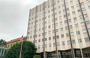 Image of a multi-story concrete building.