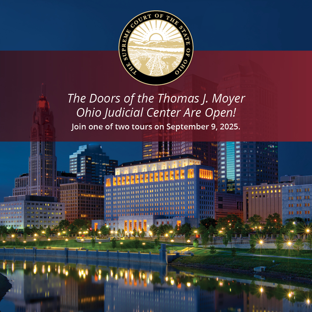 Evening view of the Moyer Judicial Center with a view of downtown Columbus in the background.