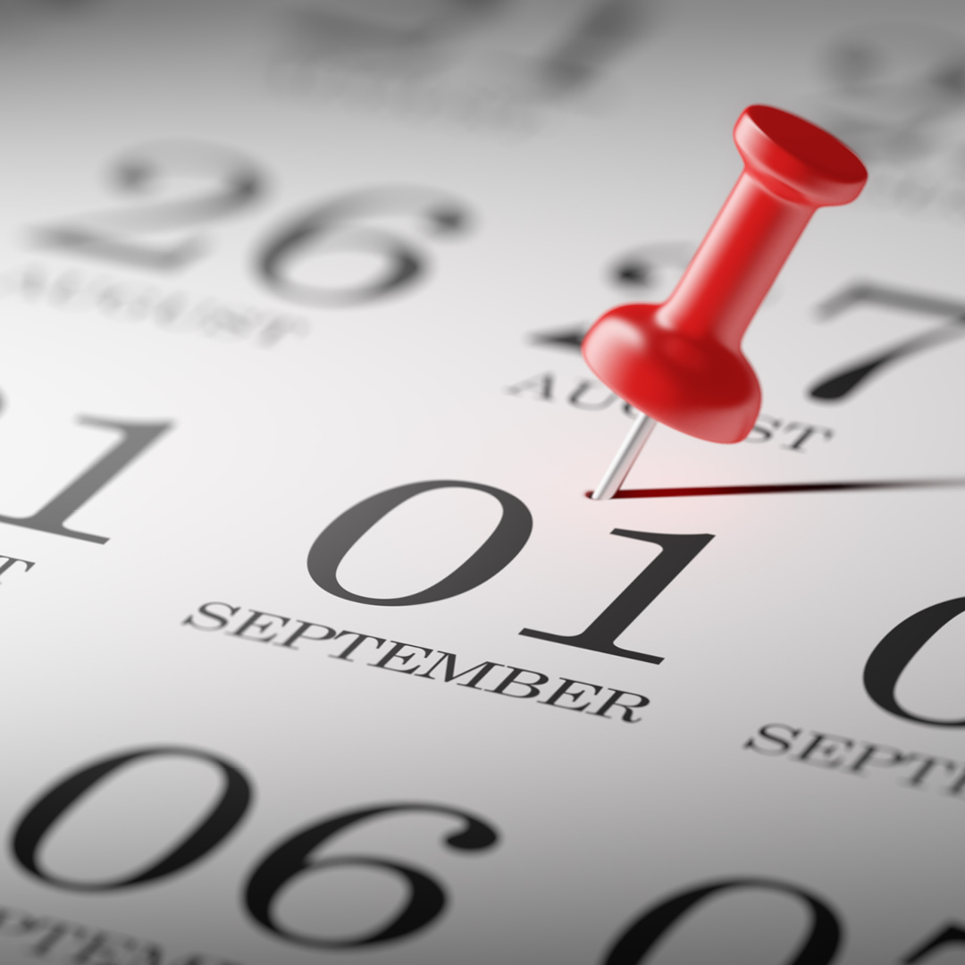 A red pin marking September 1 on a calendar