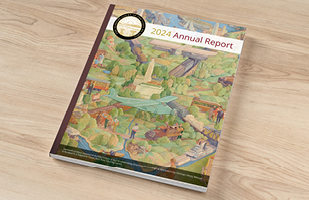 A booklet sitting on a desk with the title '2024 annual report' with the Supreme Court of Ohio seal in the top corner of the page