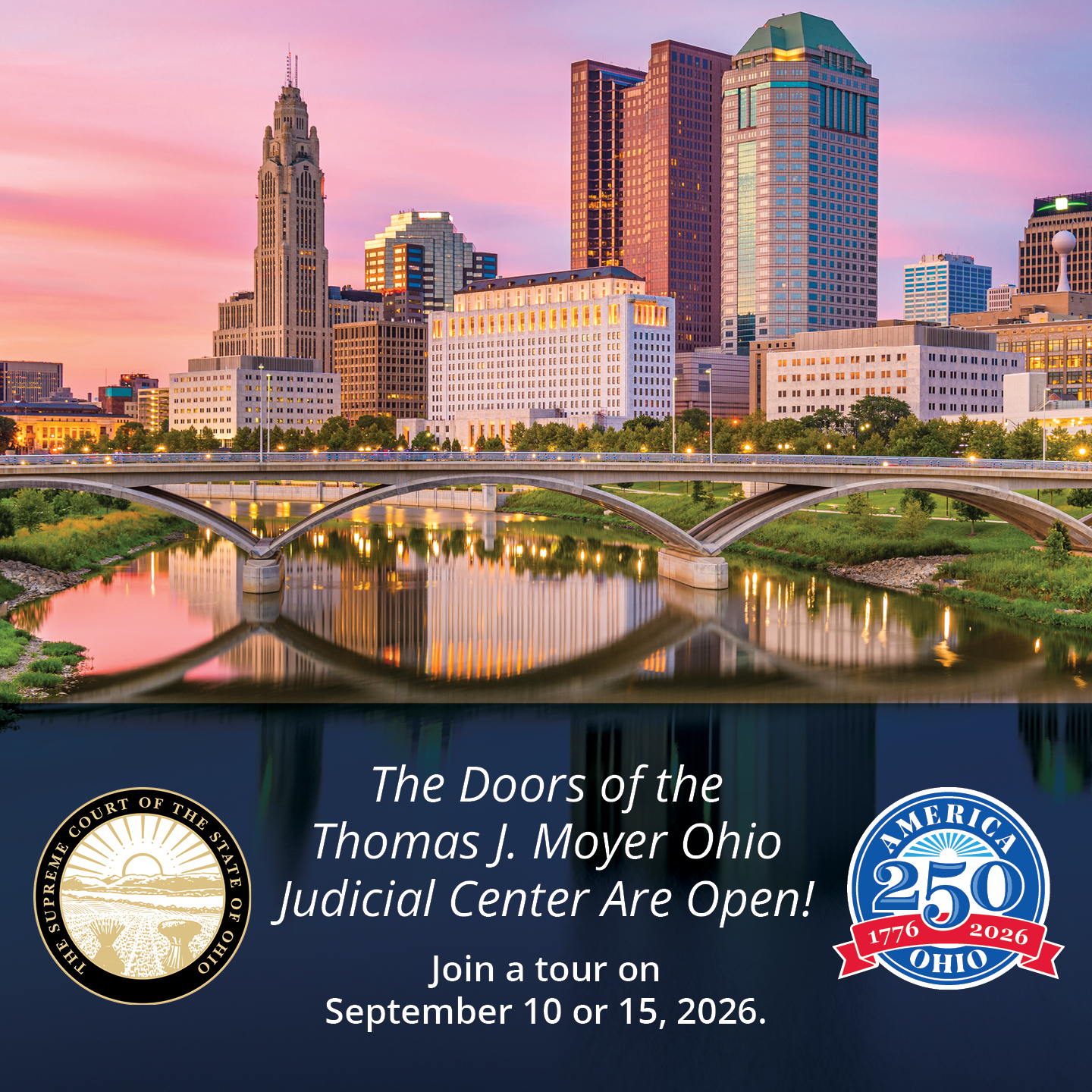 City skyline at twilight with the Thomas J. Moyer Ohio Judicial Center and a bridge over a river, reflecting colorful sky hues.