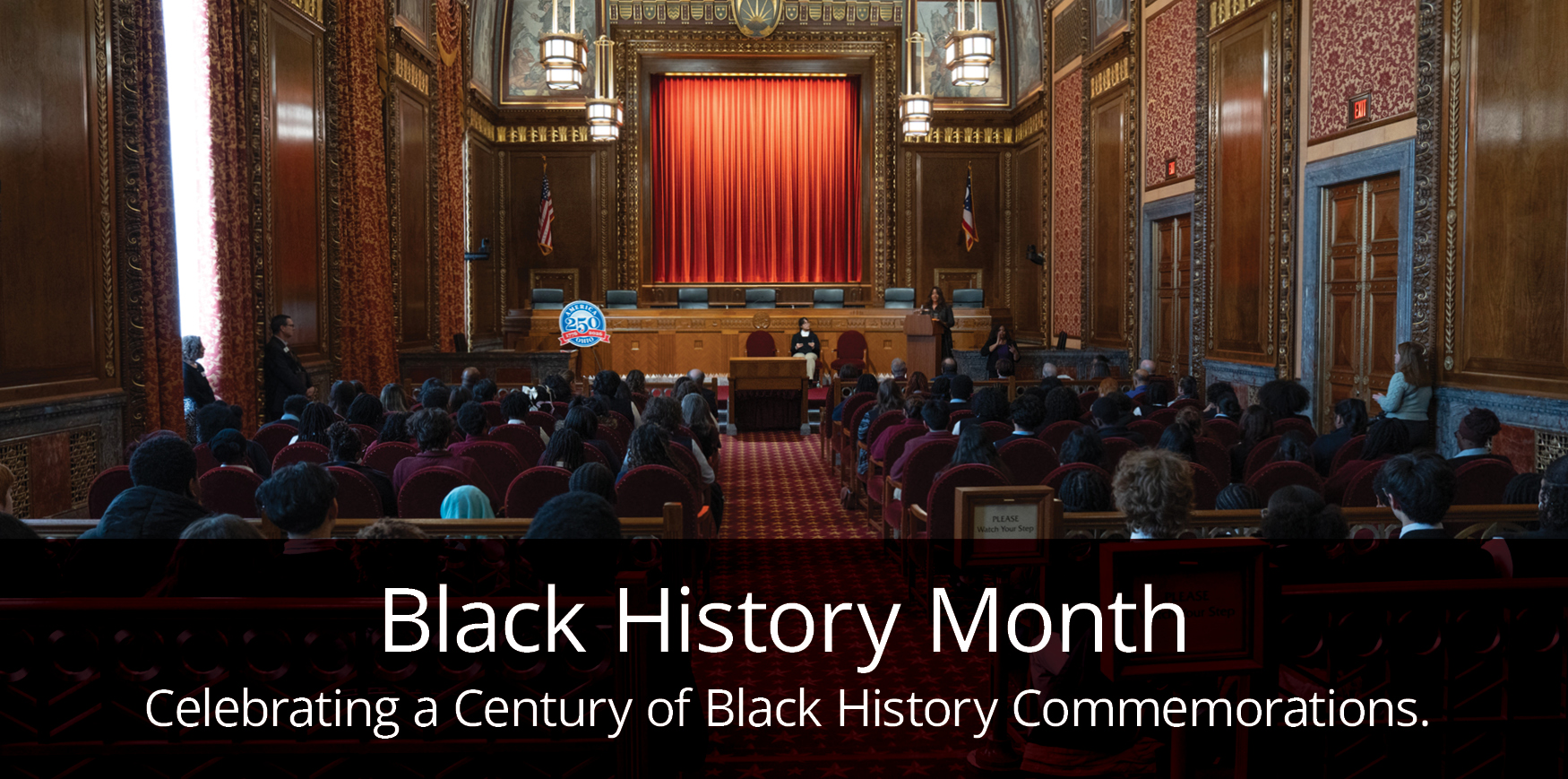 A courtroom full of people and text that reads 'Black History Month, Celebrating a Century of Black History Commemorations.'