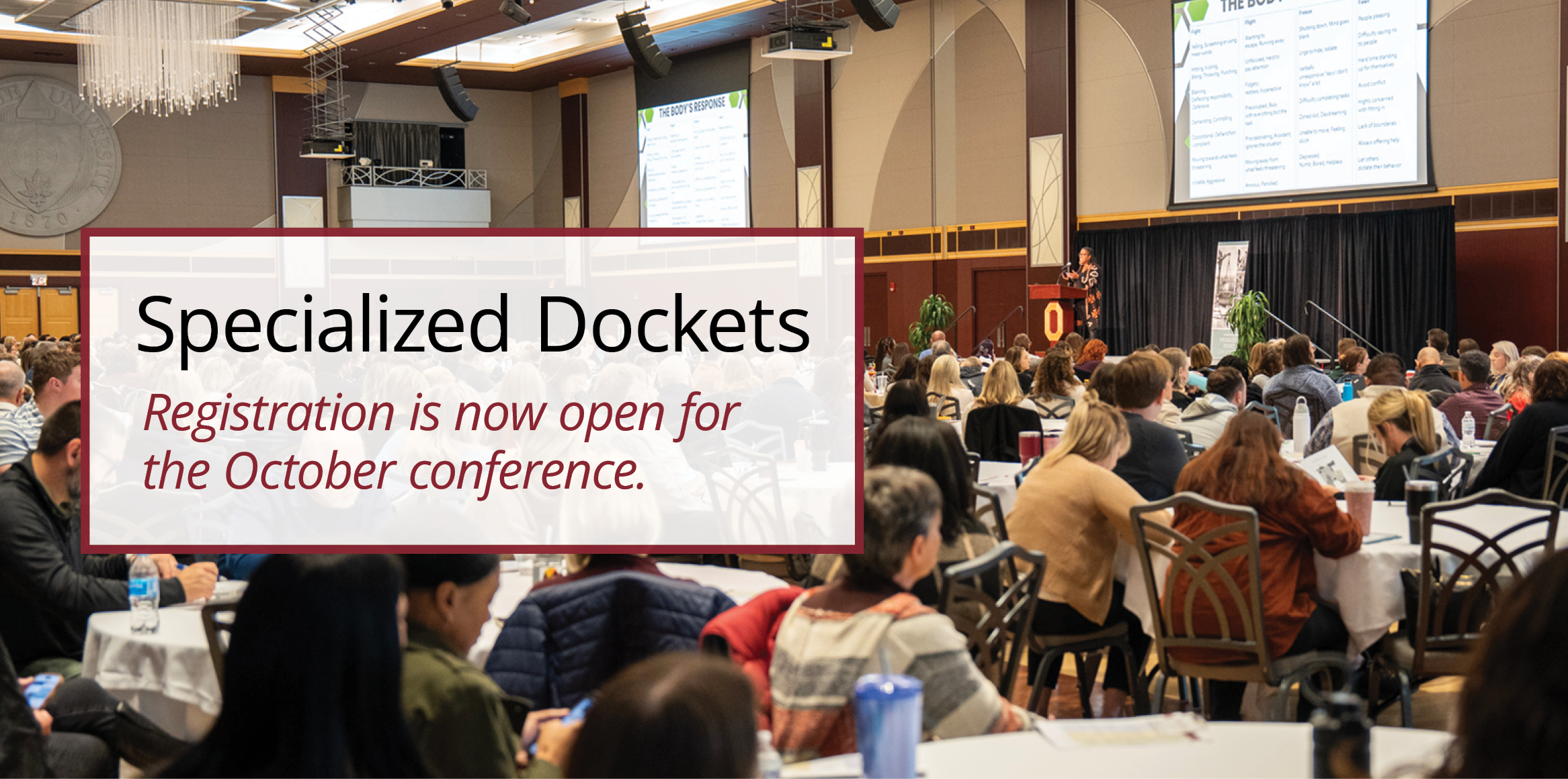 Conference audience listening to a speaker, with an overlay announcing specialized docket registration for the October conference.