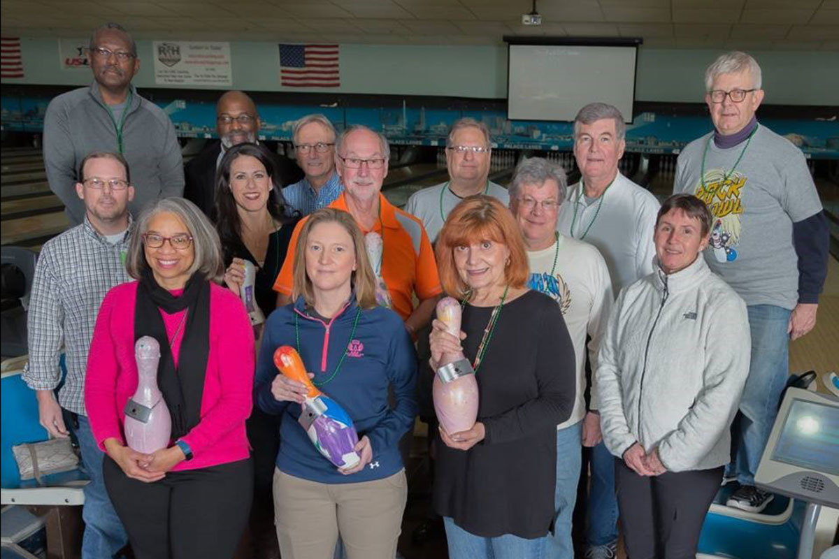 Image of a group of people in a bowling alley