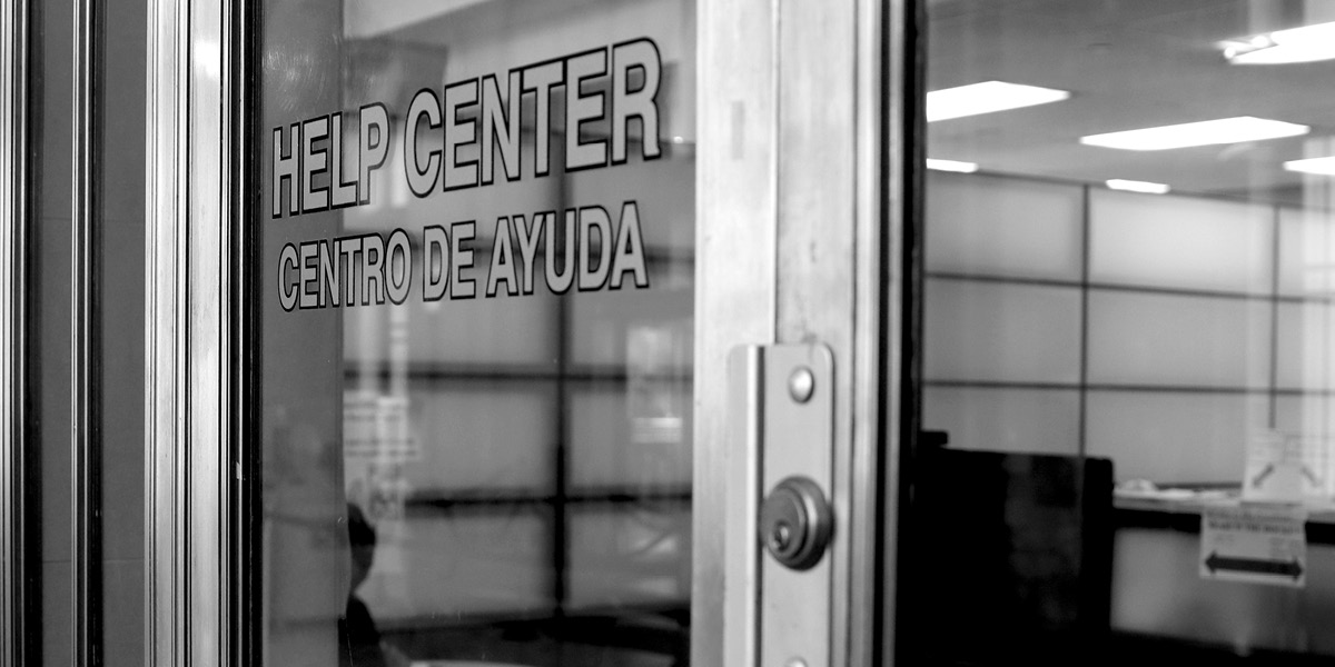 Image of the front door to a help center.