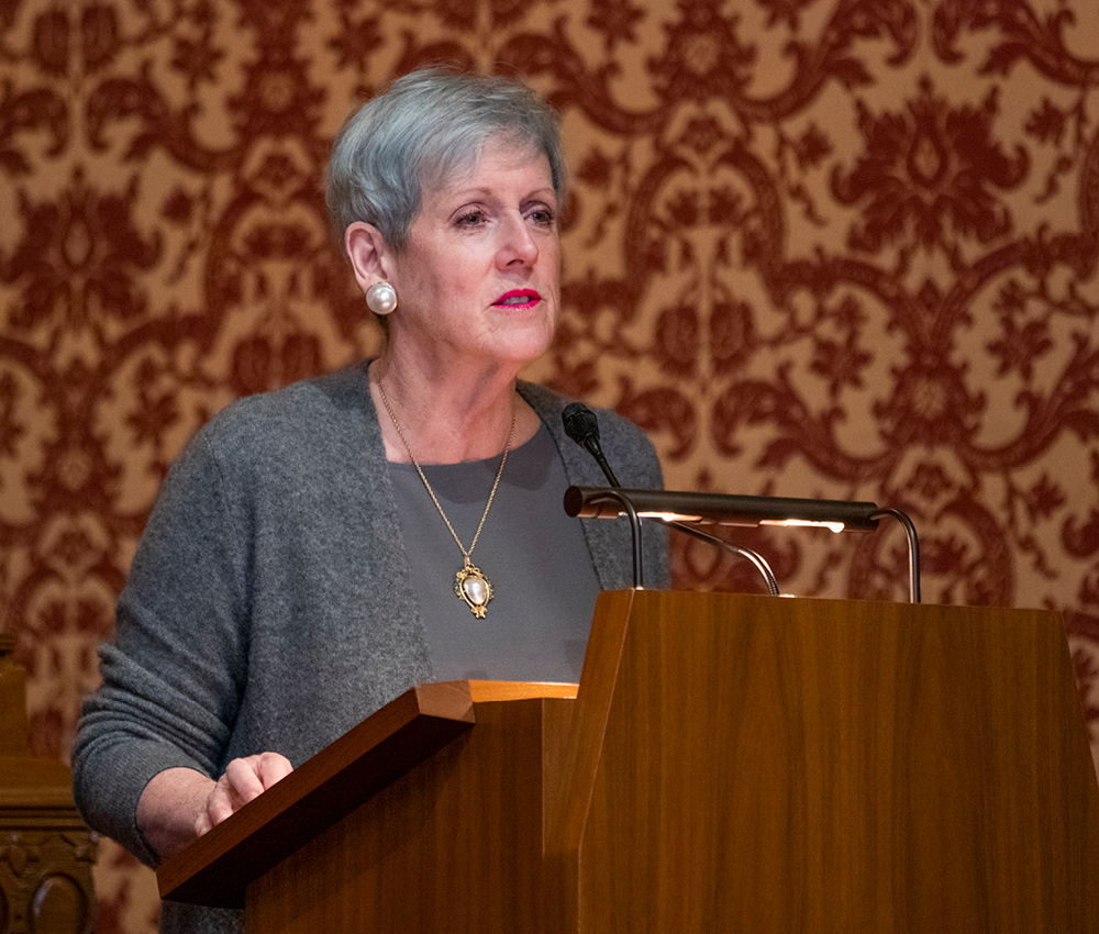 Image of Supreme Court Chief Justice Maureen O'Connor speaking from behind a podium